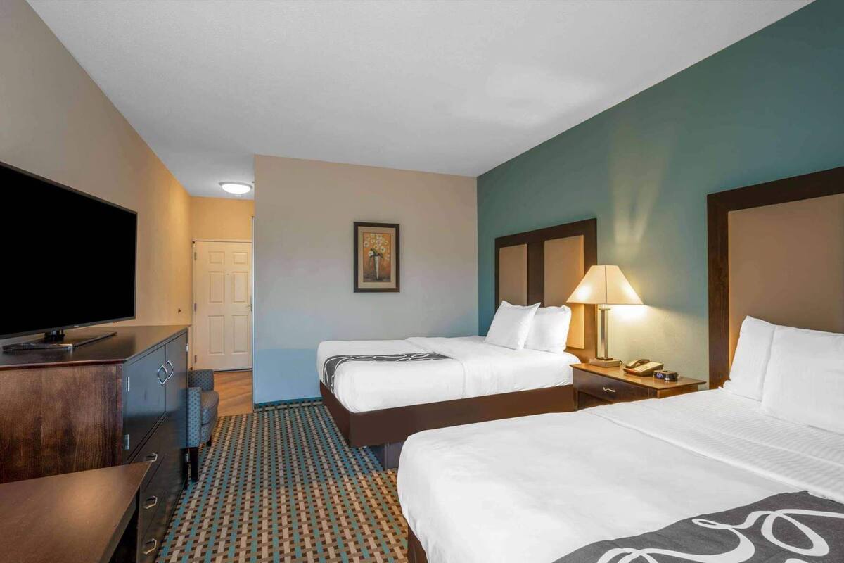 Premium bedding, pillowtop beds, desk, laptop workspace