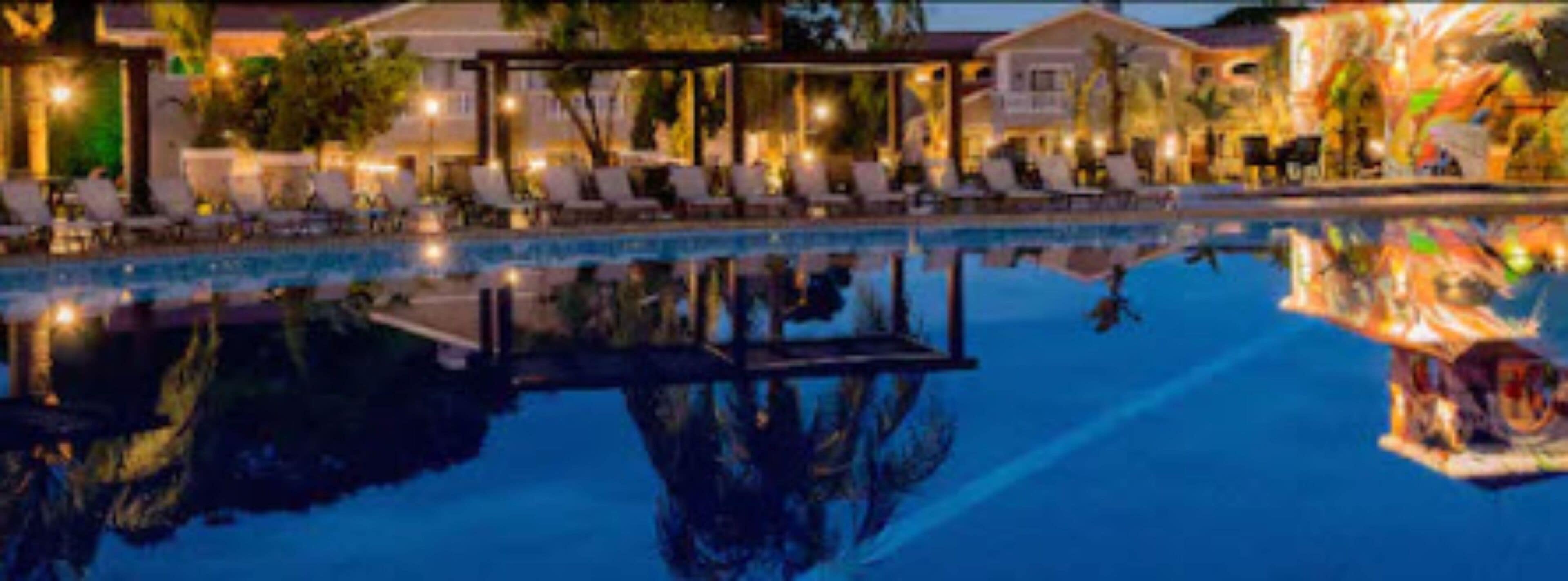 outdoor pool, pool umbrellas, pool loungers