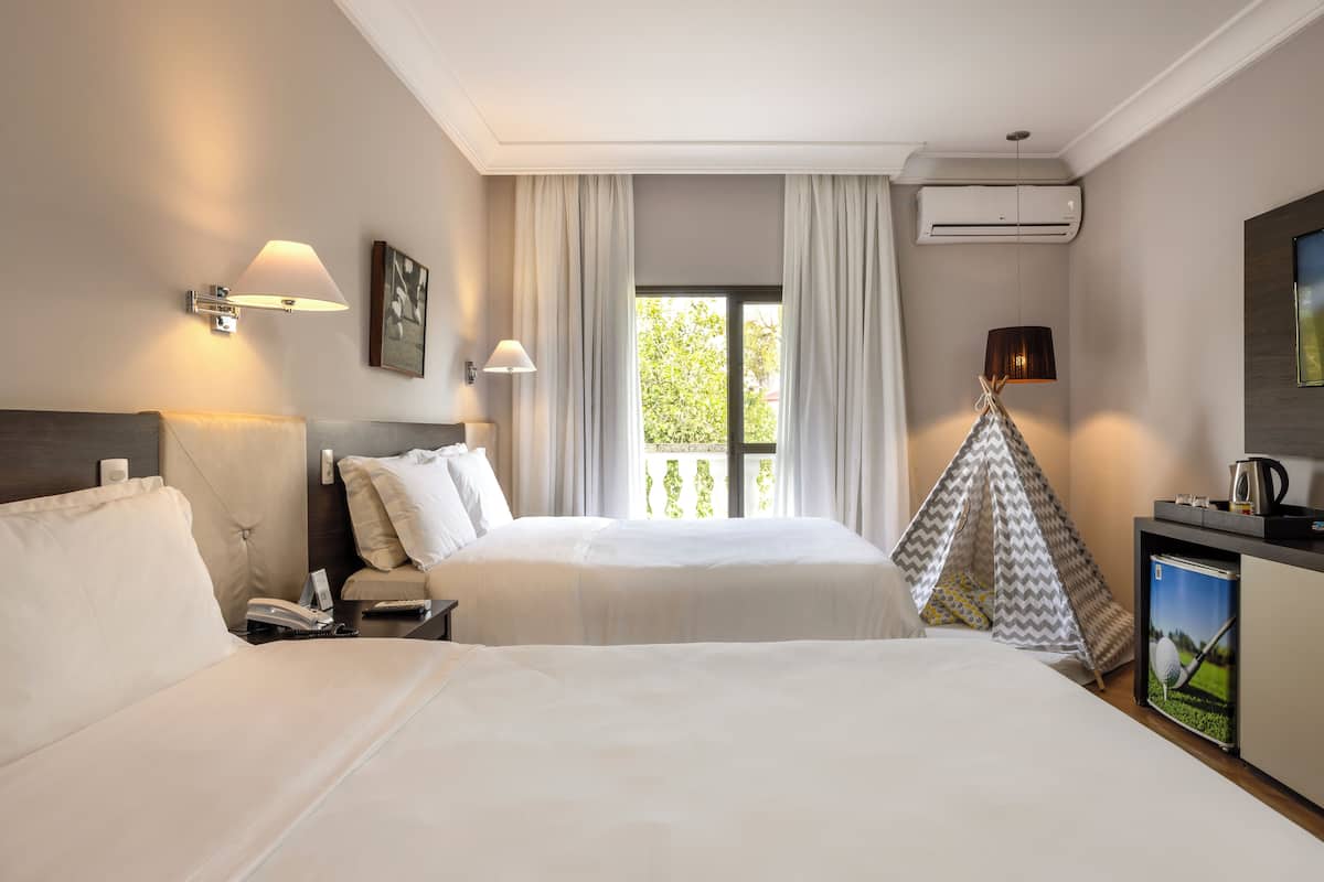 family room, 2 double beds | 1 bedroom, hypo-allergenic bedding, minibar, in-room safe