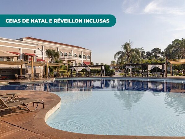 Outdoor pool, pool umbrellas, sun loungers