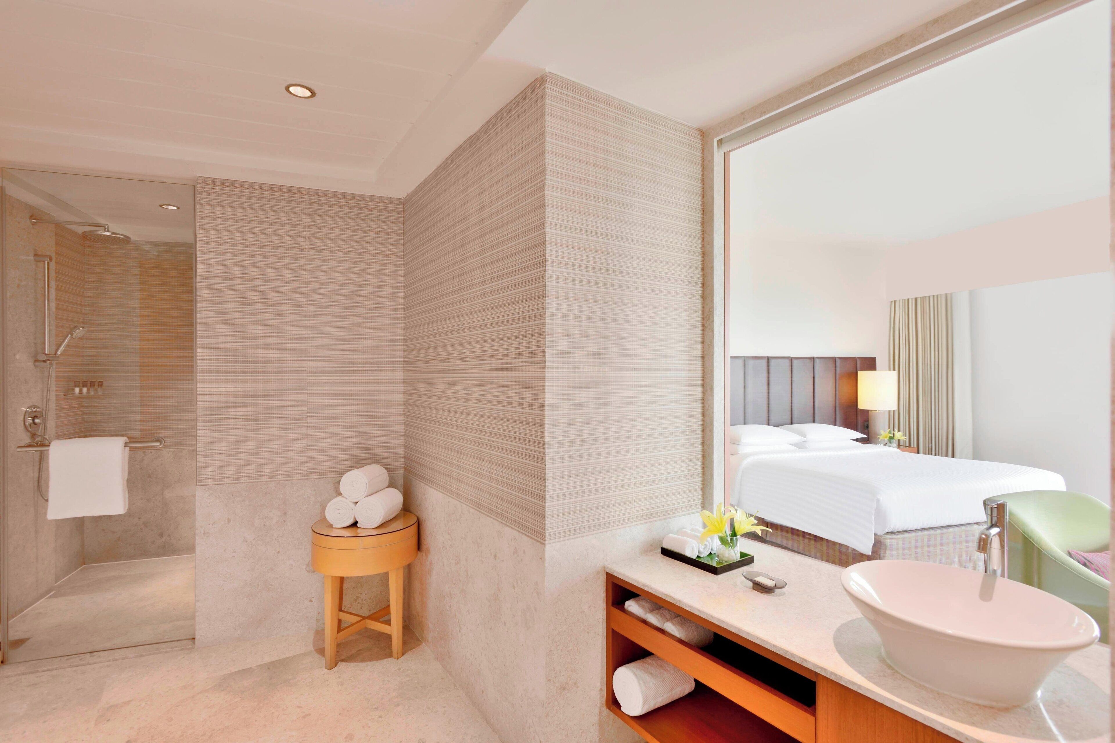 premium king room with executive lounge access | bathroom | shower, rainfall showerhead, free toiletries, hair dryer