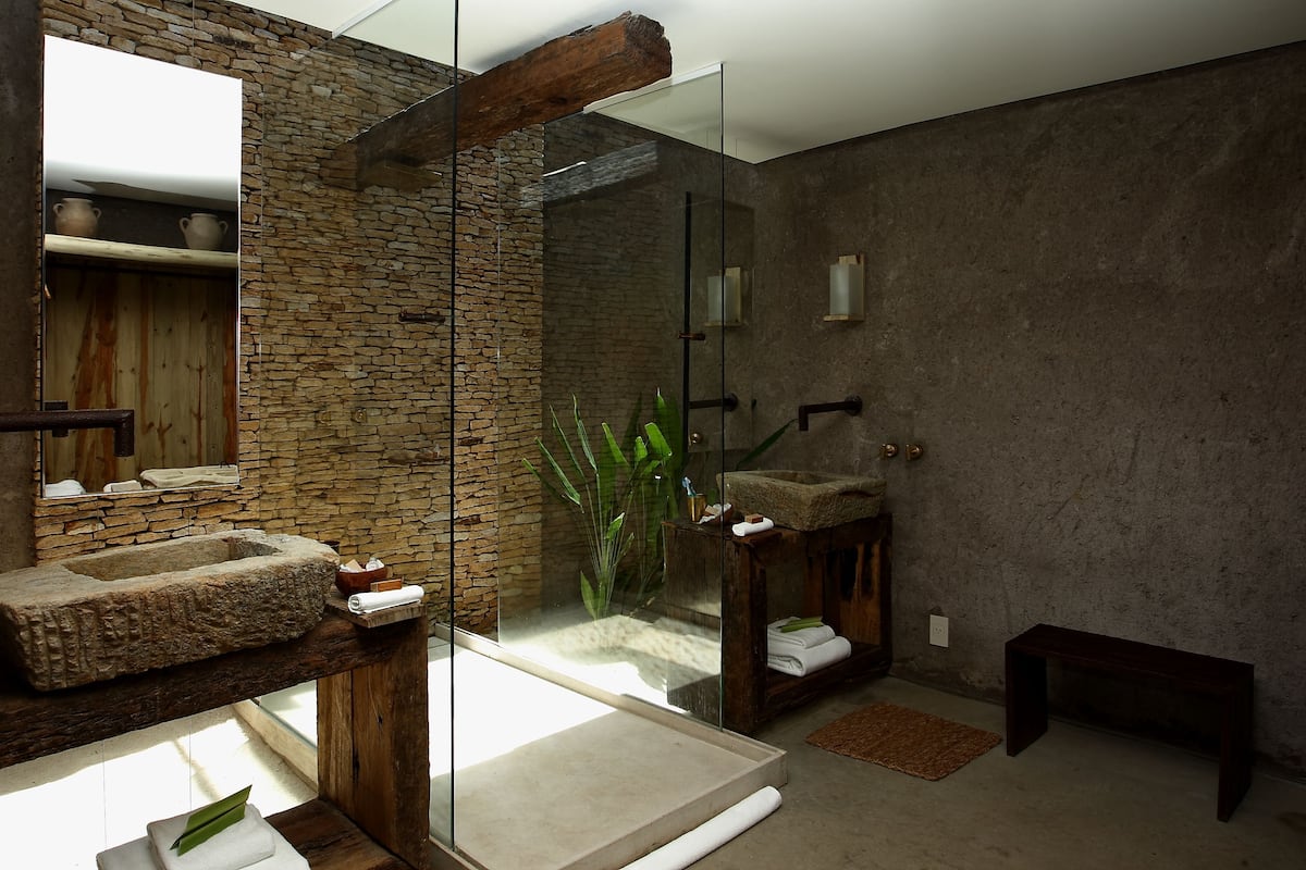 suite (apoena suite) | bathroom | free toiletries, hair dryer, bathrobes, slippers