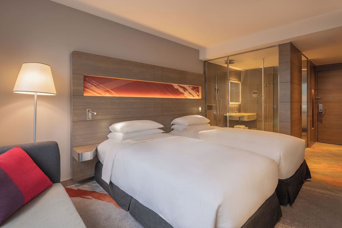 Premium bedding, down comforters, in-room safe, desk