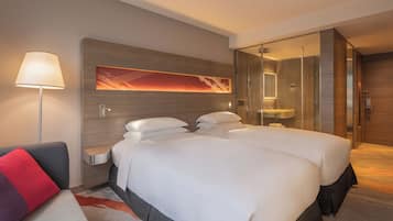 Premium bedding, down comforters, in-room safe, desk