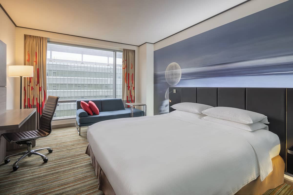 Premium bedding, down duvets, in-room safe, desk