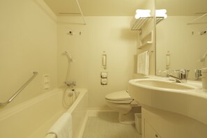 Combined shower/tub, deep soaking tub, designer toiletries, hair dryer