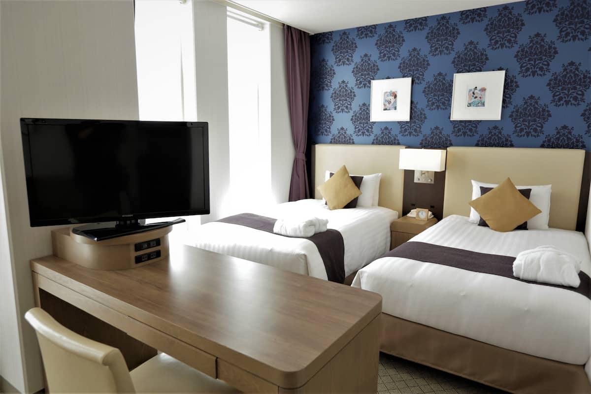 Chambre Deluxe, 2 lits une place, non-fumeurs | Coffres-forts dans les chambres, bureau, rideaux occultants
