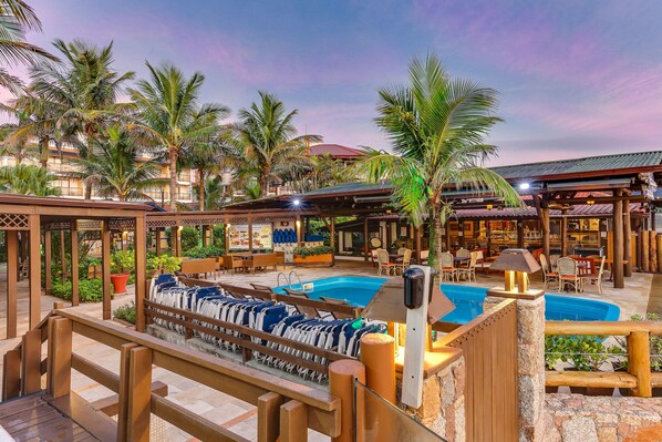 Indoor pool, outdoor pool, pool umbrellas, pool loungers