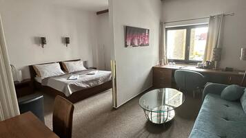 Apartment, 1 King Bed | Minibar, in-room safe, desk, laptop workspace
