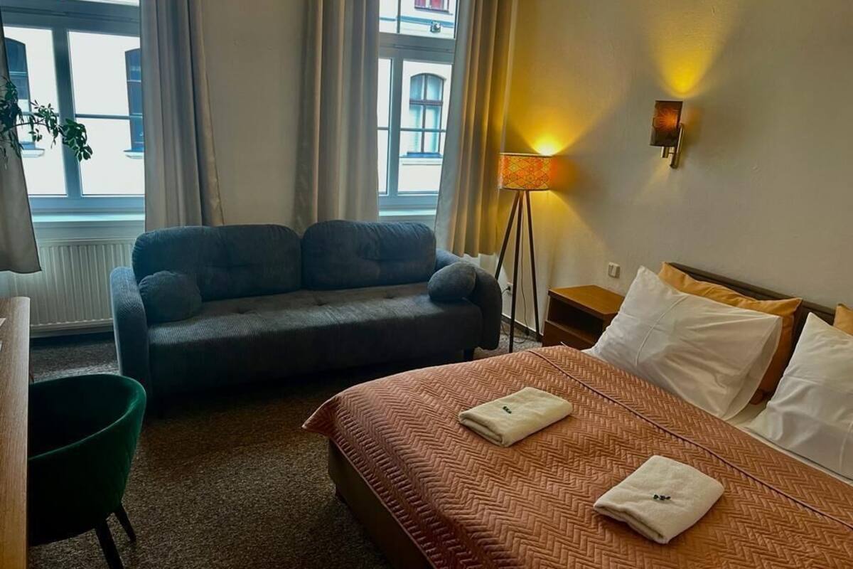 double or twin room | minibar, in-room safe, desk, laptop workspace