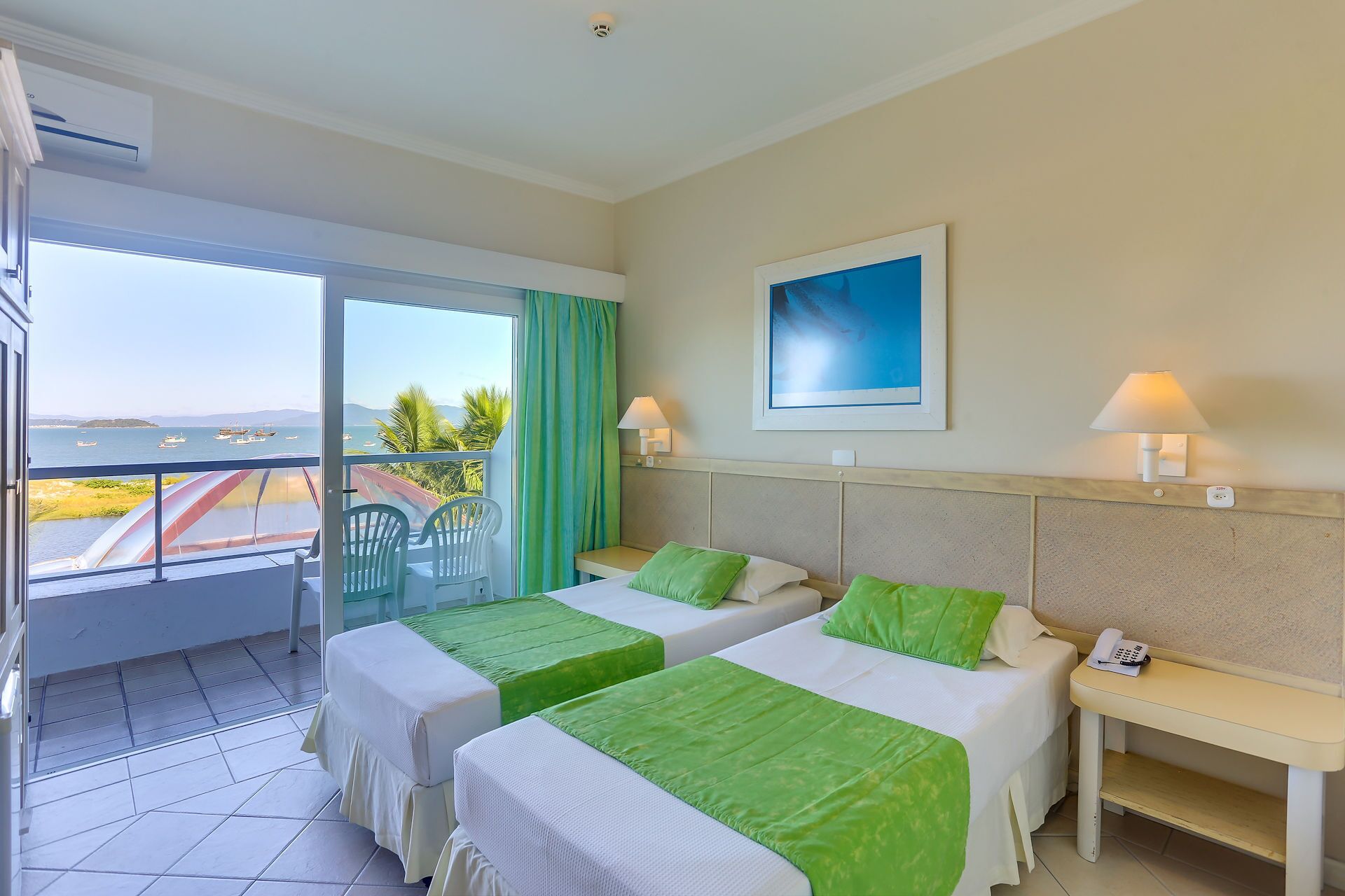 family room | 1 bedroom, minibar, in-room safe, desk