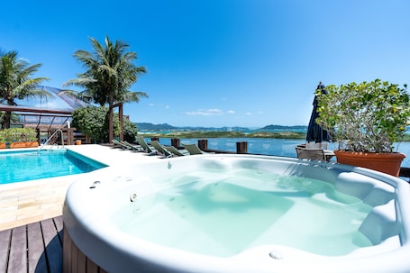 Indoor pool, outdoor pool, pool umbrellas, sun loungers