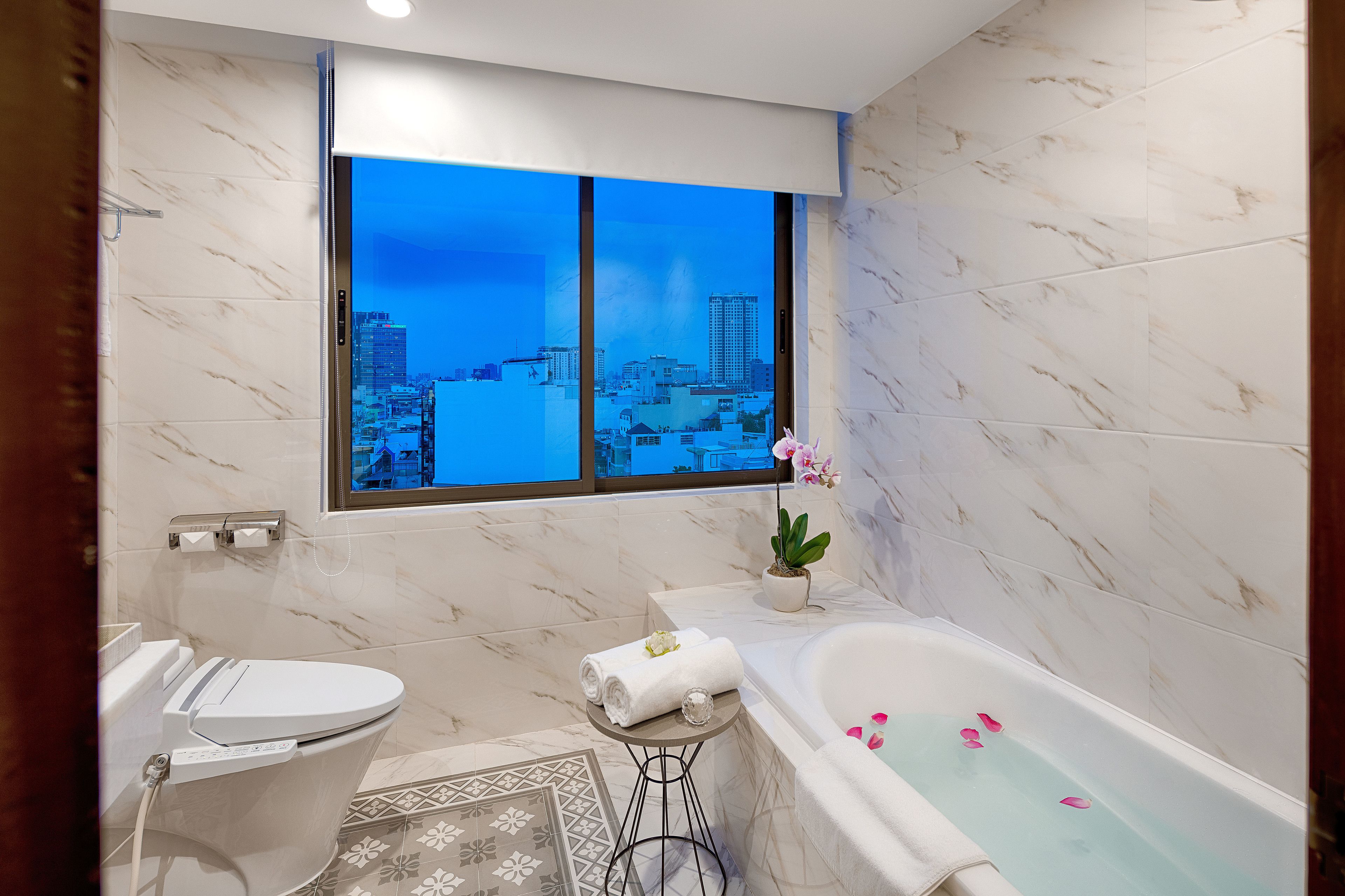 postumia suite with afternoon tea free 1 signature cocktail | bathroom | free toiletries, hair dryer, bathrobes, slippers