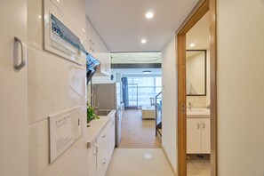 Deluxe-Zweibettzimmer | Schreibtisch, Verdunkelungsvorhänge, kostenloses WLAN