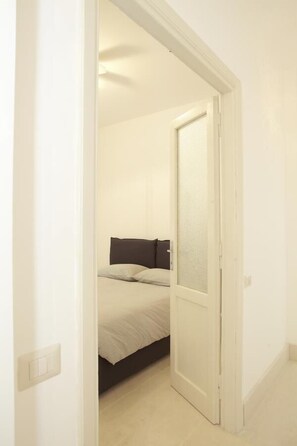 Apartamento, 1 quarto | 2 quartos, Wi-Fi de cortesia, roupa de cama