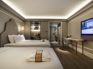 Cubrecamas, colchones con pillow-top y minibar