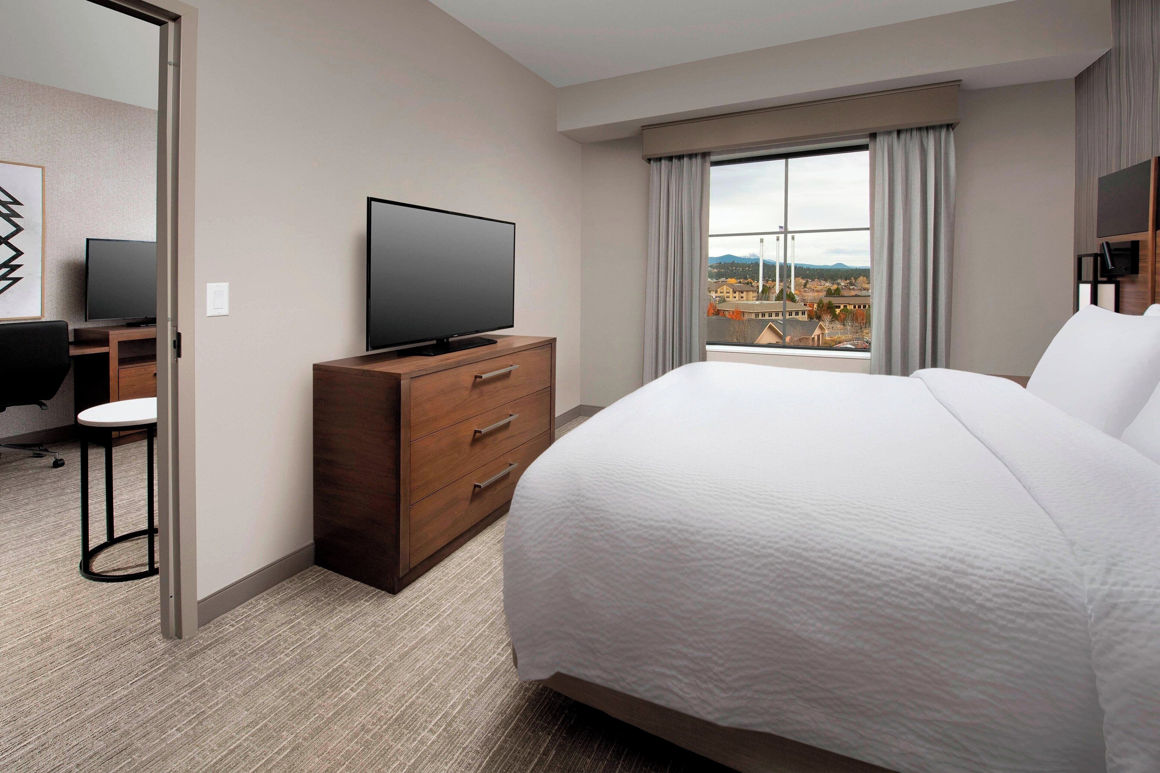 desk, laptop workspace, blackout curtains, iron/ironing board