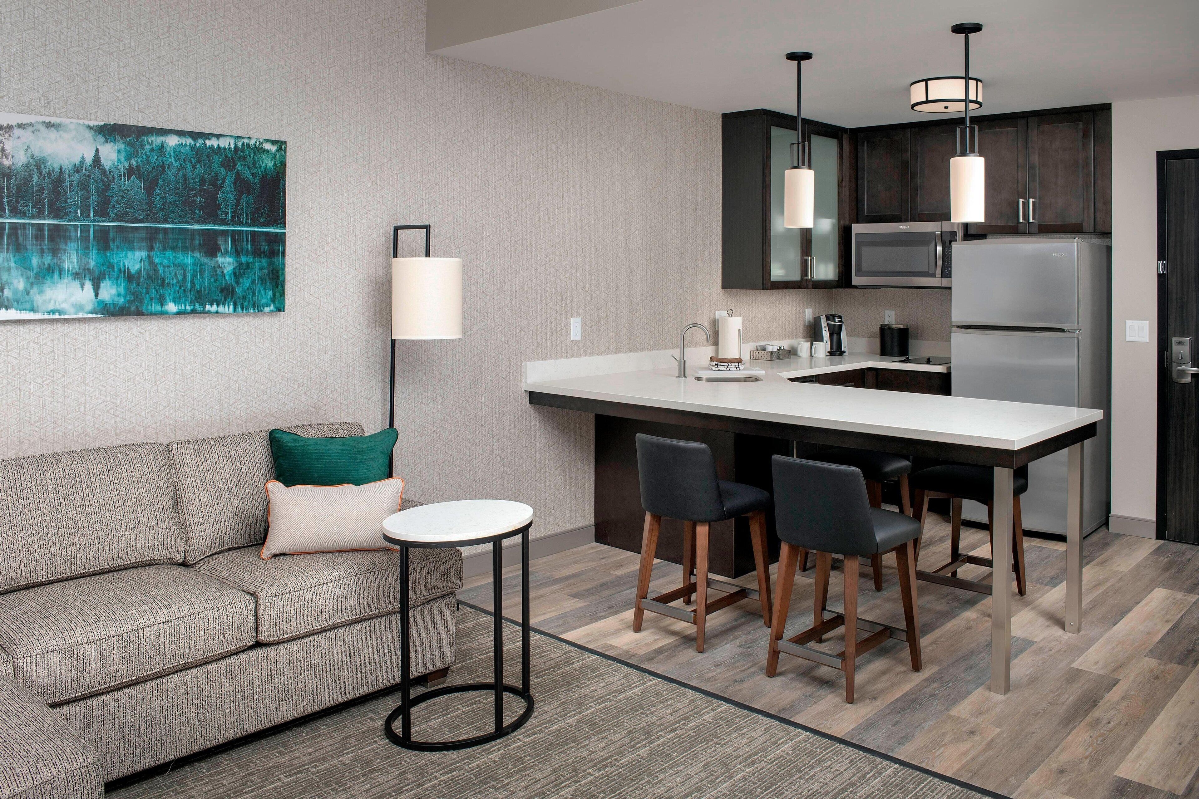 full-sized fridge, microwave, stovetop, dishwasher