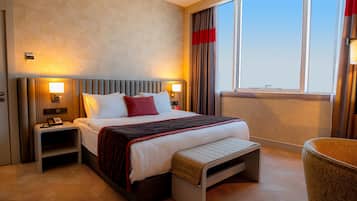 Egyptian cotton sheets, premium bedding, minibar, in-room safe