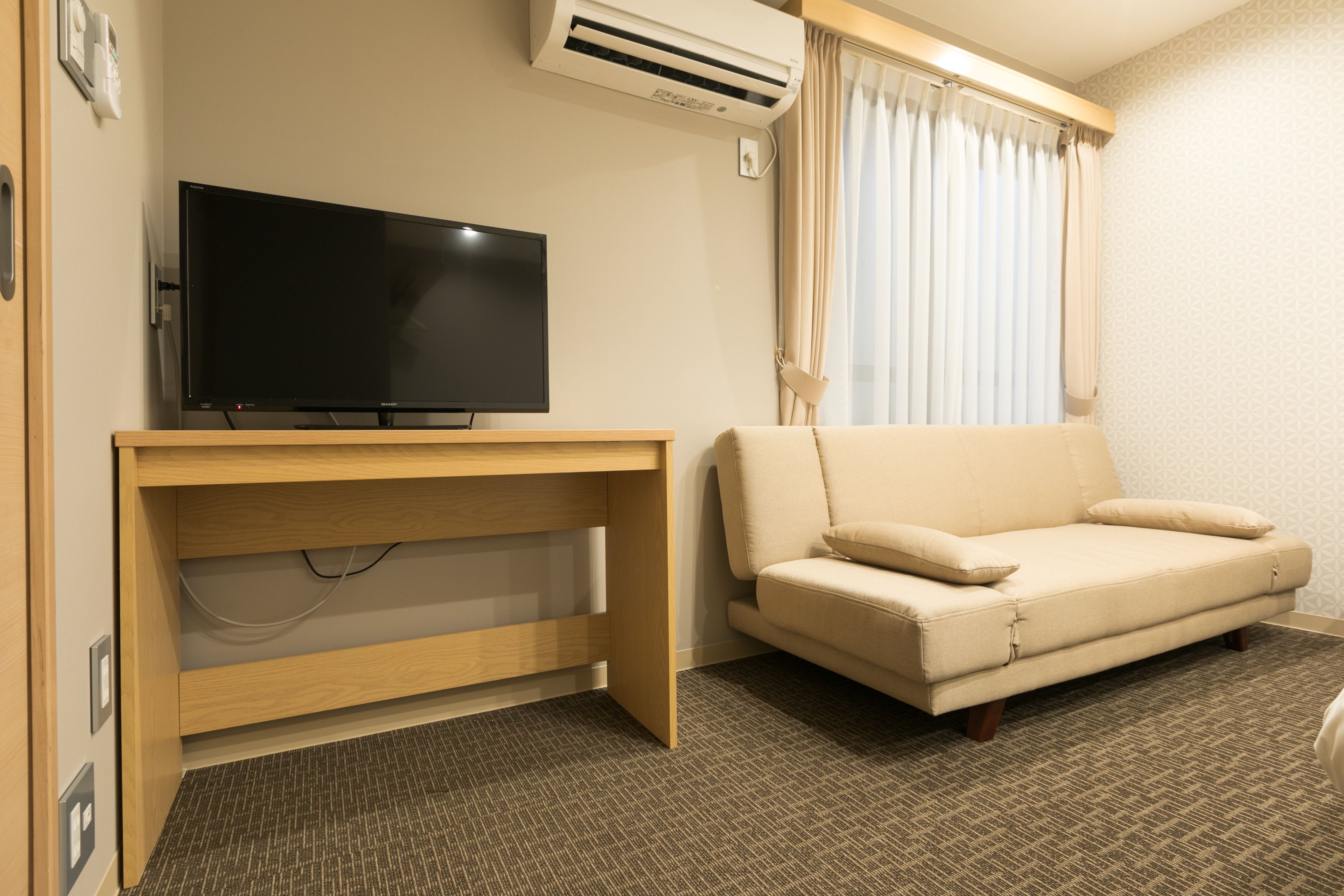 Studio Apartment | Living area | Flat-screen TV