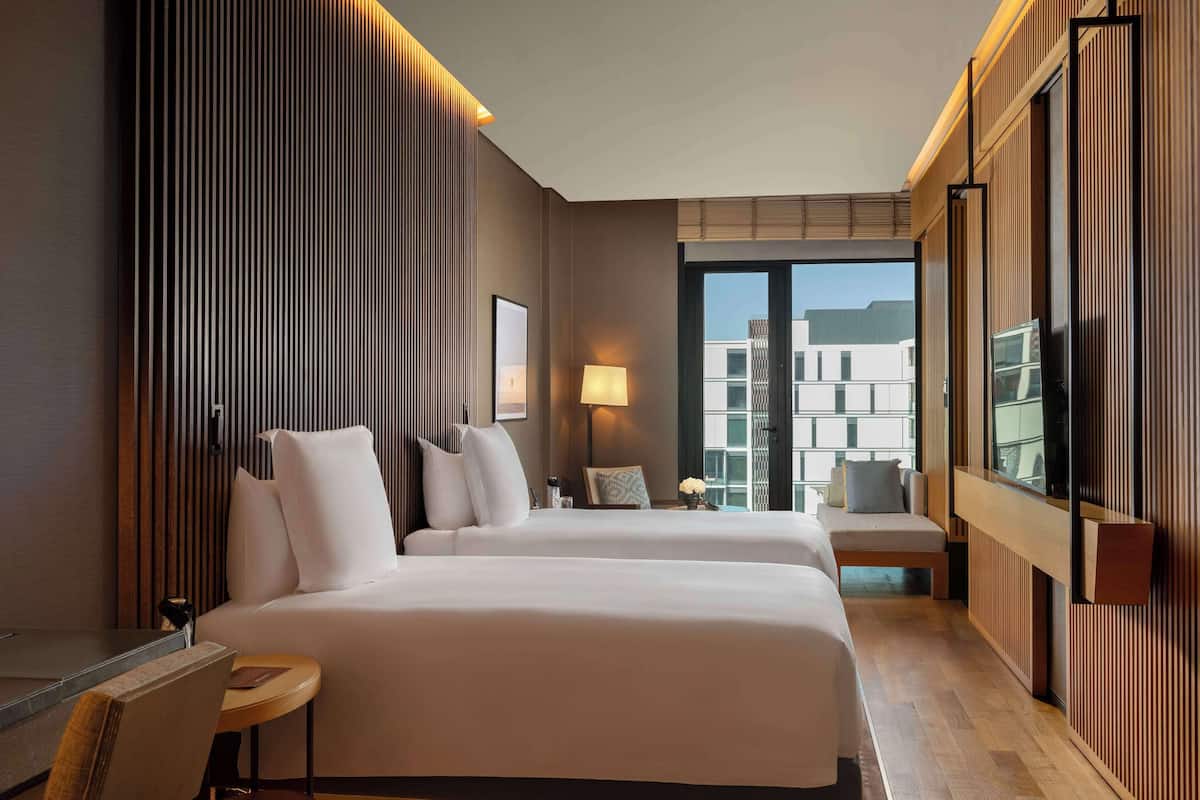 Premium bedding, pillow-top beds, in-room safe, desk