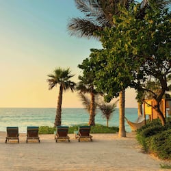 Private beach, free beach shuttle, free beach cabanas, sun loungers