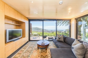 Comfort appartement, 1 queensize bed, niet-roken | Woonruimte | Flatscreentelevisie