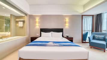 Habitación Deluxe doble | Escritorio, cortinas opacas, wifi gratis y ropa de cama
