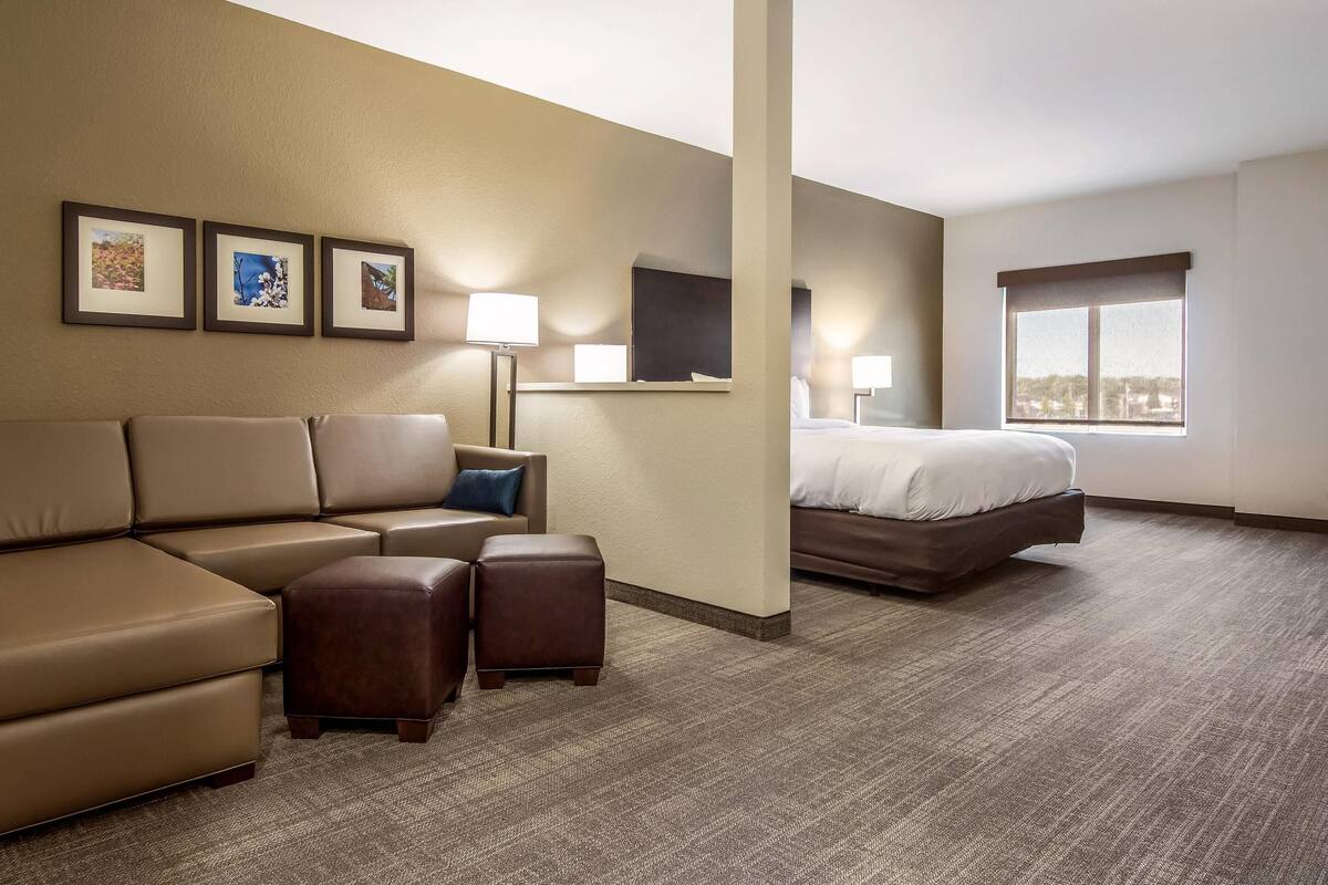 Premium bedding, desk, laptop workspace, blackout curtains