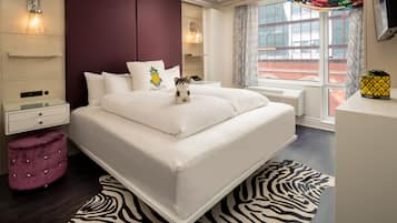 Premium bedding, down comforters, blackout drapes, free WiFi