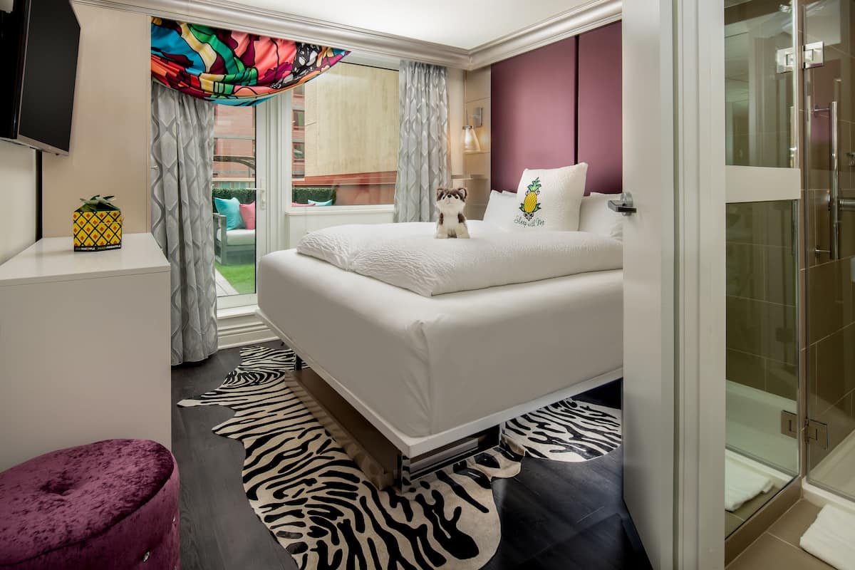 1 bedroom, premium bedding, down duvets, blackout curtains