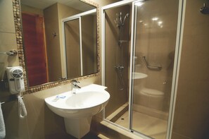 Shower, free toiletries, hair dryer, towels