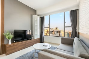 Comfort Apartment, 2 Bedrooms, City View, Tower | Living room | Flat-screen TV