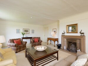 House, Multiple Beds | Living area | Flat-screen TV