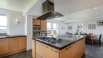 House, Multiple Beds | Private kitchen
