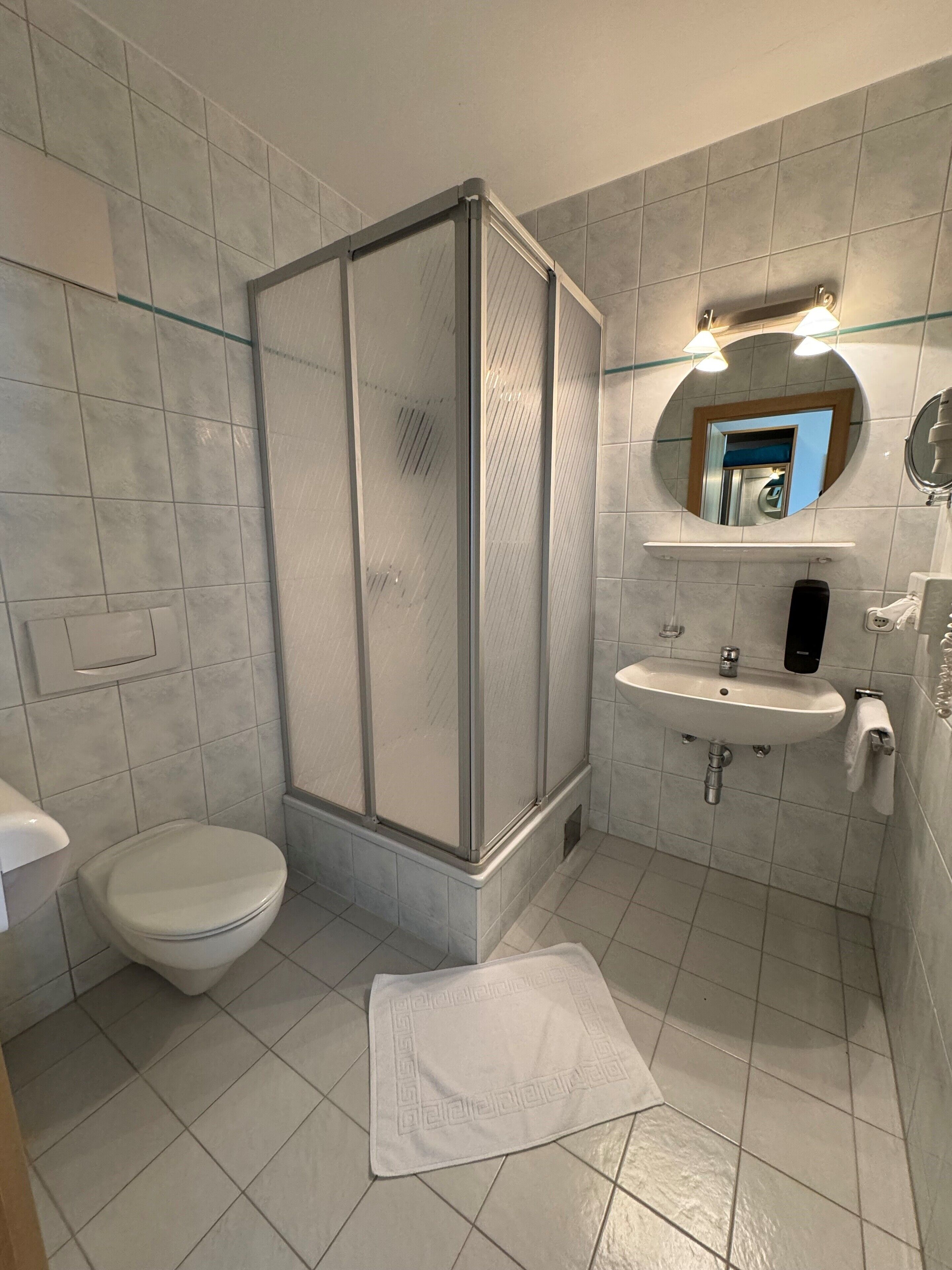 hair dryer, bathrobes, towels