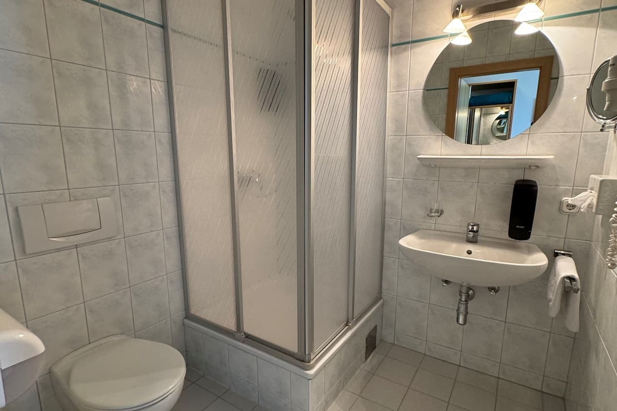 hair dryer, bathrobes, towels