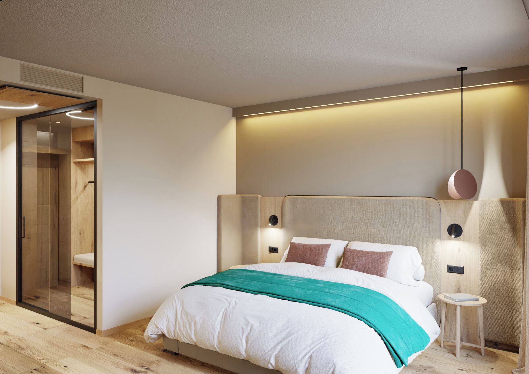 A modern bedroom with a large bed, a bedside table, and a walk-in closet.