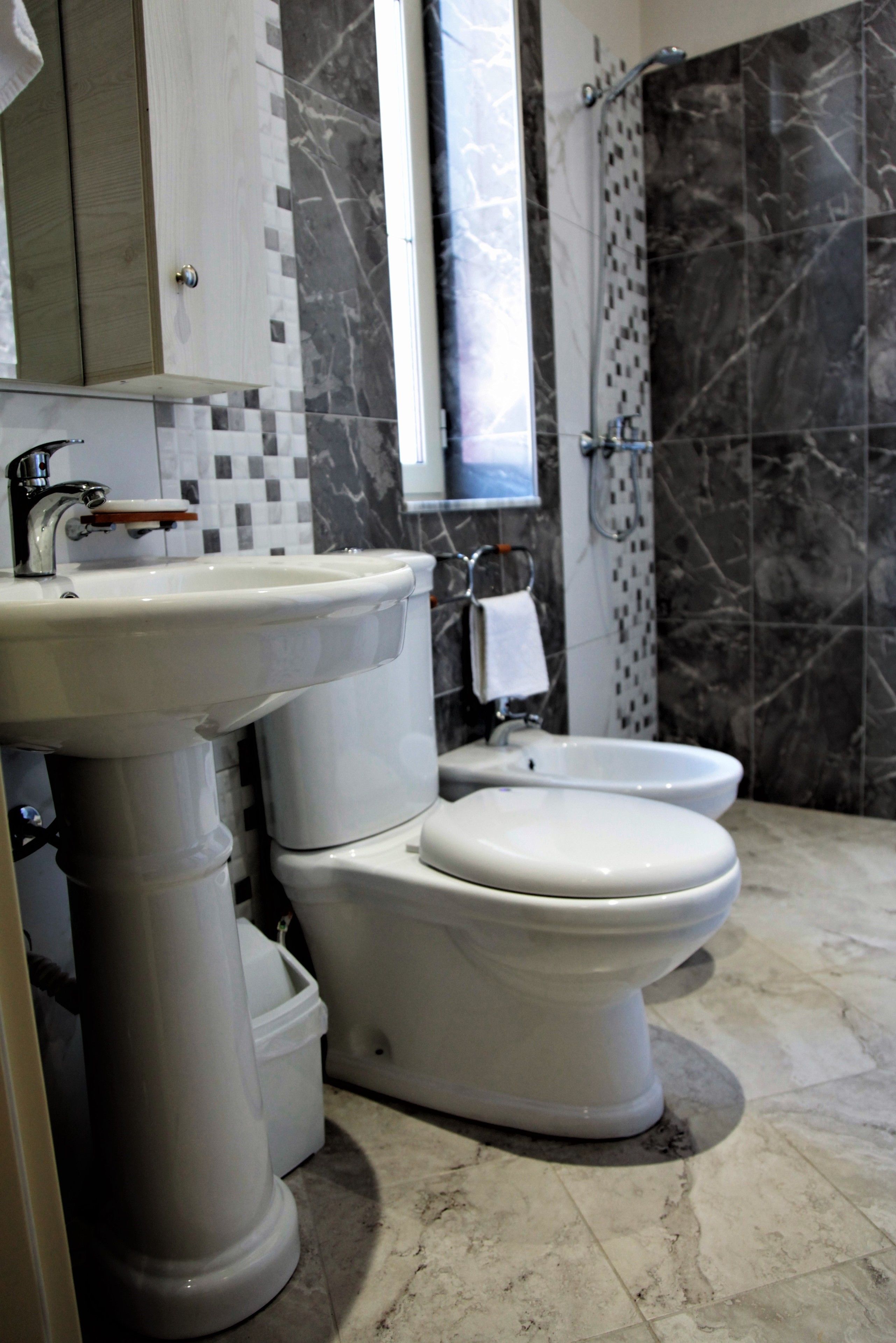 shower, free toiletries, hair dryer, slippers