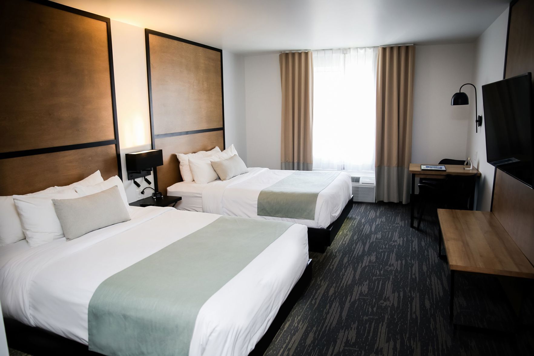 Premium bedding, blackout drapes, soundproofing, iron/ironing board
