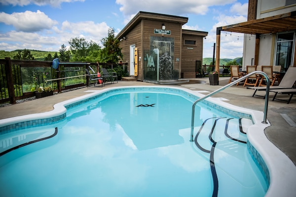 Outdoor pool, open 9:00 AM to 10:30 PM, pool umbrellas, sun loungers