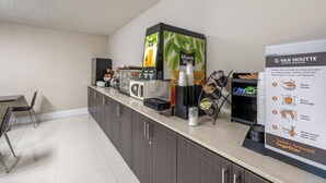 A coffee station with a coffee machine, a refrigerator, and a sign detailing the coffee service process. - SureStay Hotel by Best Western Kemptville (North Grenville)