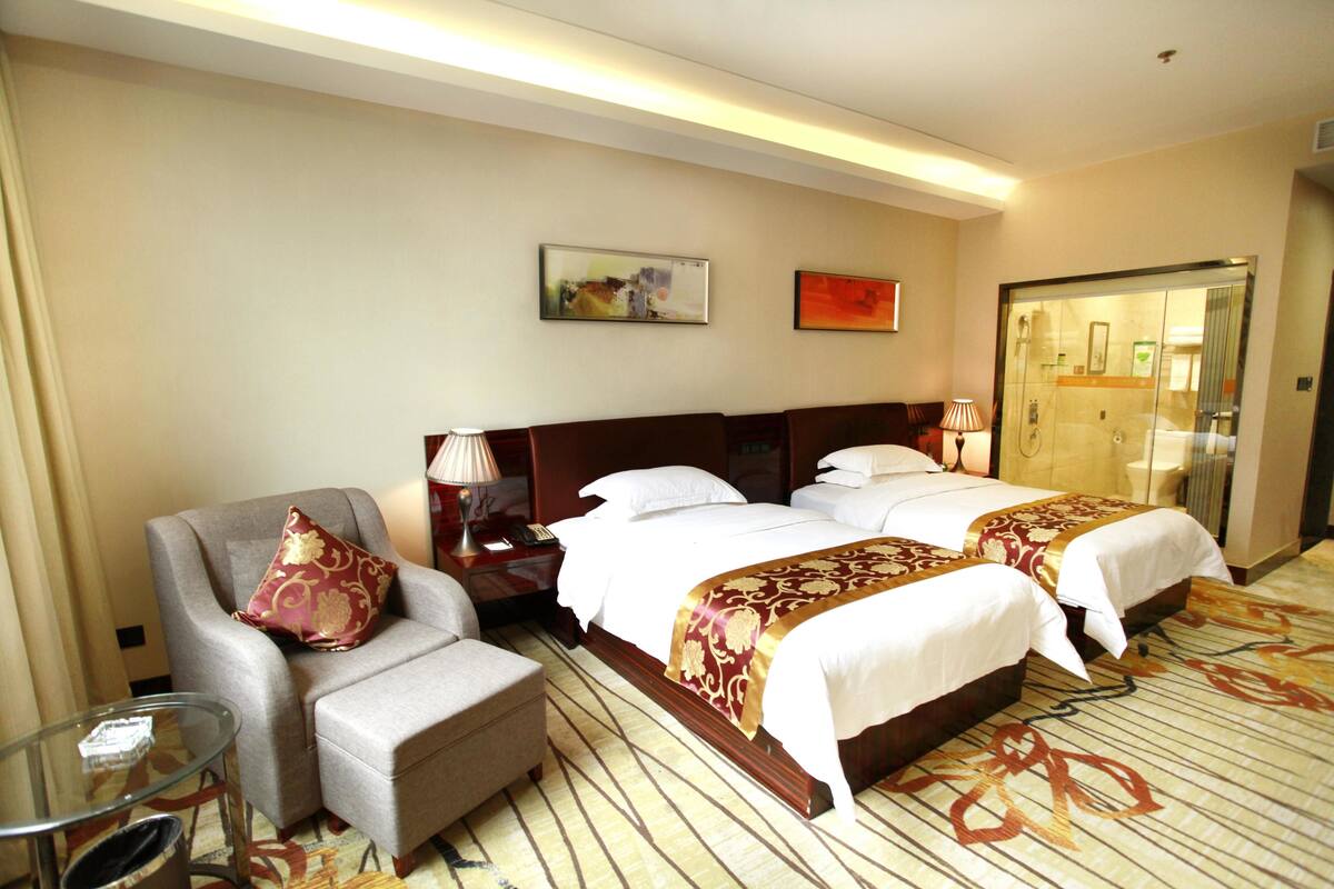 Desk, blackout drapes, rollaway beds (surcharge), WiFi (free)