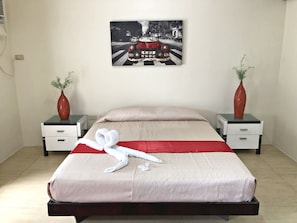 Couple Suite | Iron/ironing board, bed sheets - Quezon Premier Hotel Candelaria (Candelaria)