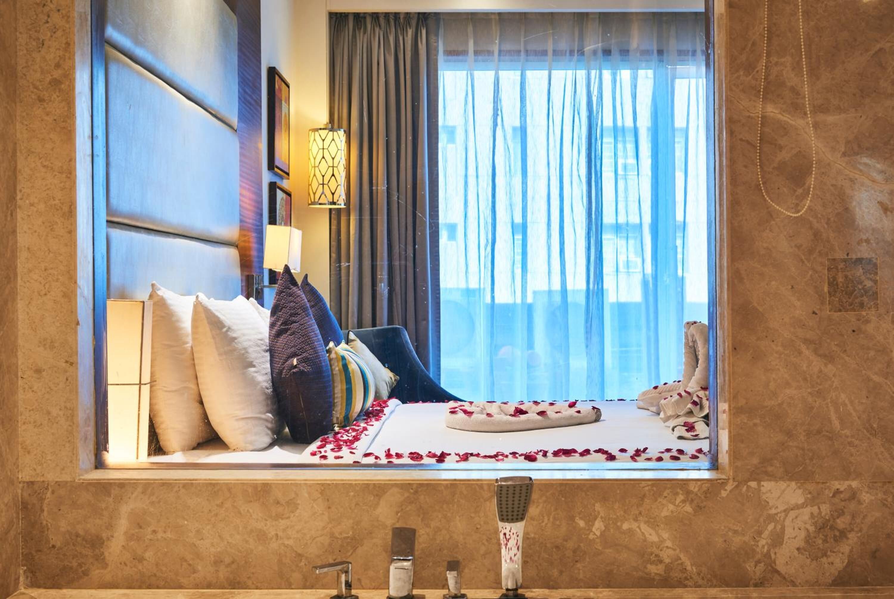 Shower, bathrobes, slippers, towels