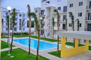 Outdoor pool, pool umbrellas, pool loungers