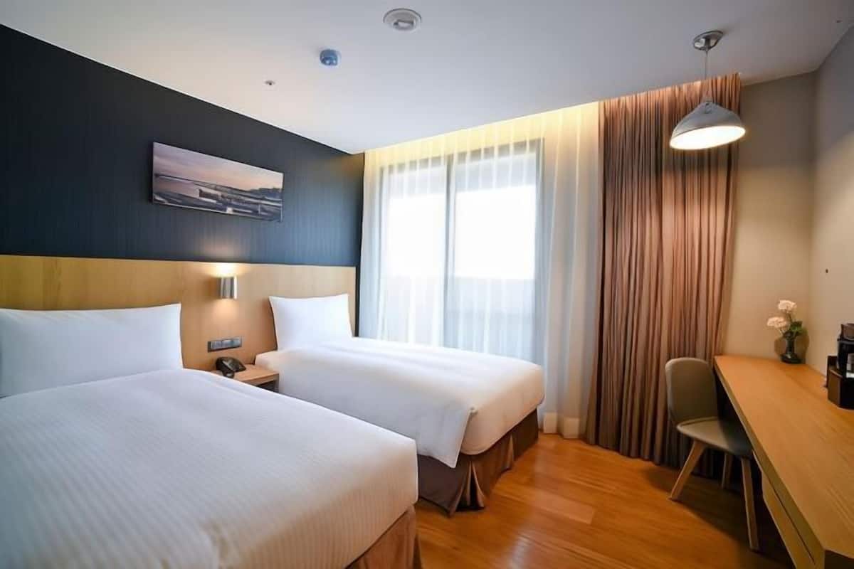 Desk, blackout drapes, WiFi (free), bed sheets