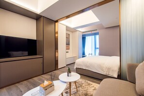 デラックス ダブルルーム クイーンベッド 1 台 禁煙 | 客室ごとに異なる装飾、遮光カーテン、WiFi (無料)、ベッドシーツ