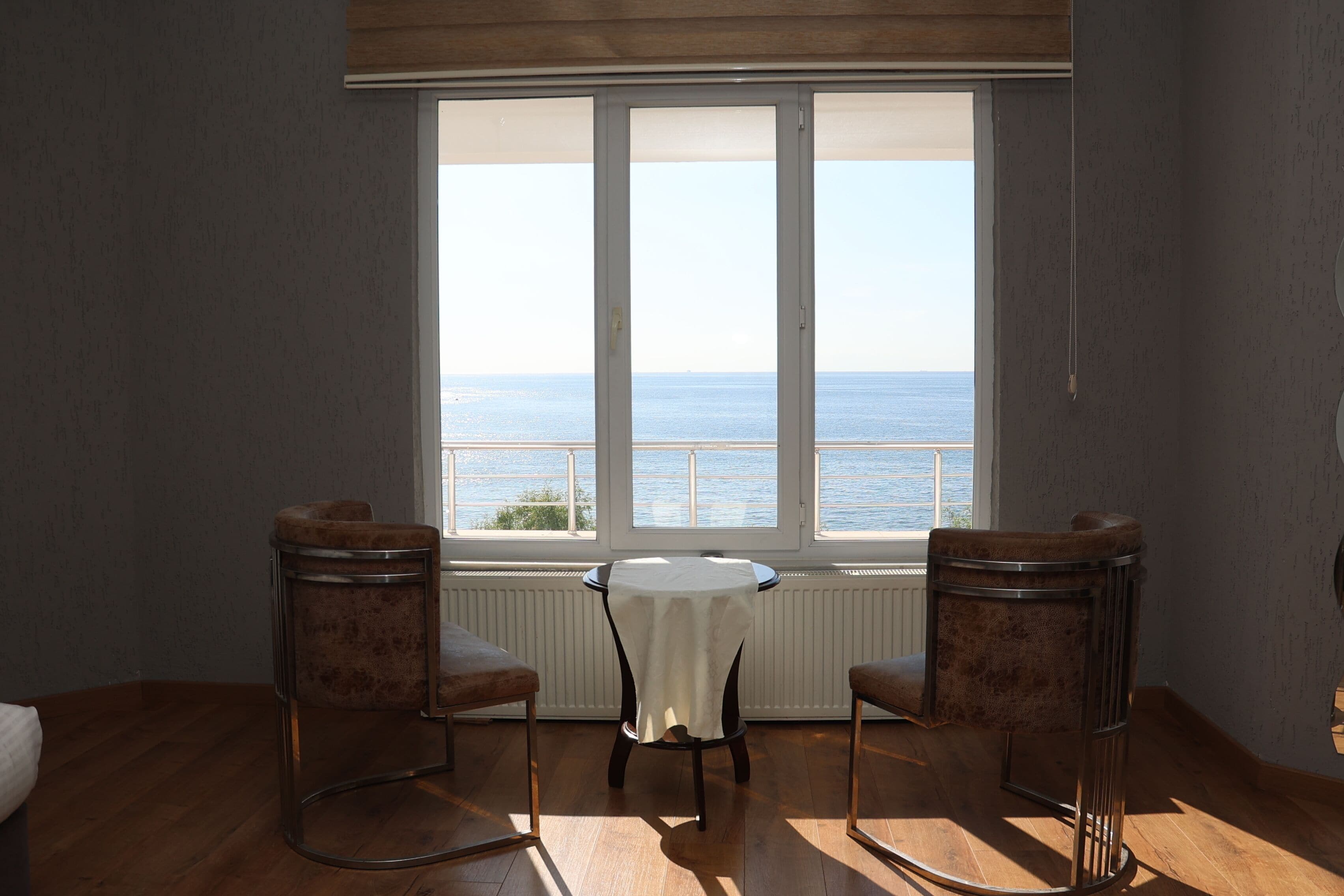 Junior Studio Suite, 1 Bedroom, Sea View | Minibar, desk, soundproofing, iron/ironing board