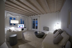 Deluxe Villa, 3 Bedrooms, Private Pool | Living room | Flat-screen TV, fireplace, MP3 dock - Villa Azurite (Mykonos)